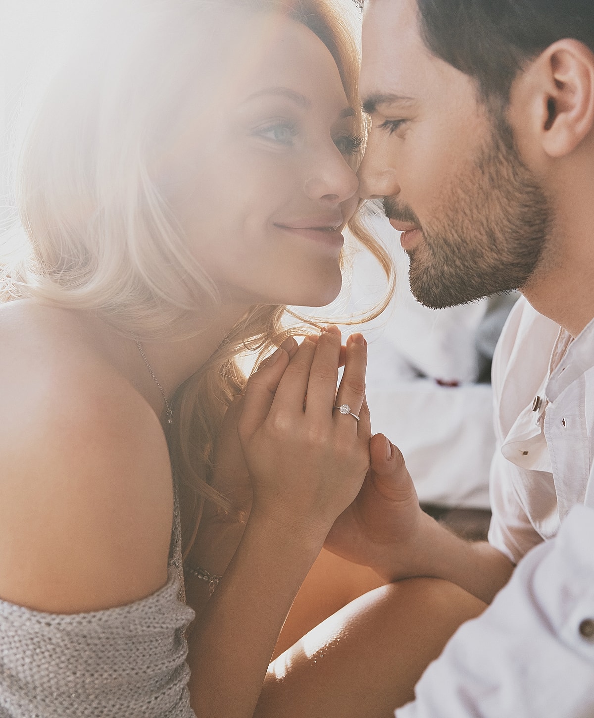 Couple sharing a tender moment, close together.